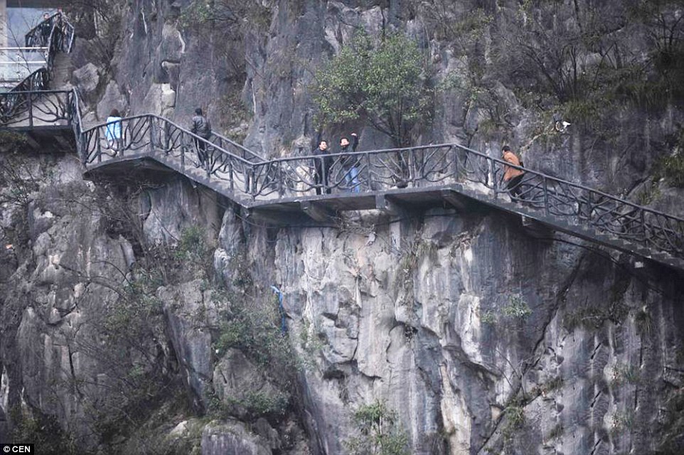 The 800 metre long walkway has already been explored by tourists, who have jumped over barriers ahead of the bridge