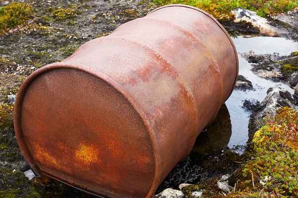 Rusting barrels polluting Arctic tundra